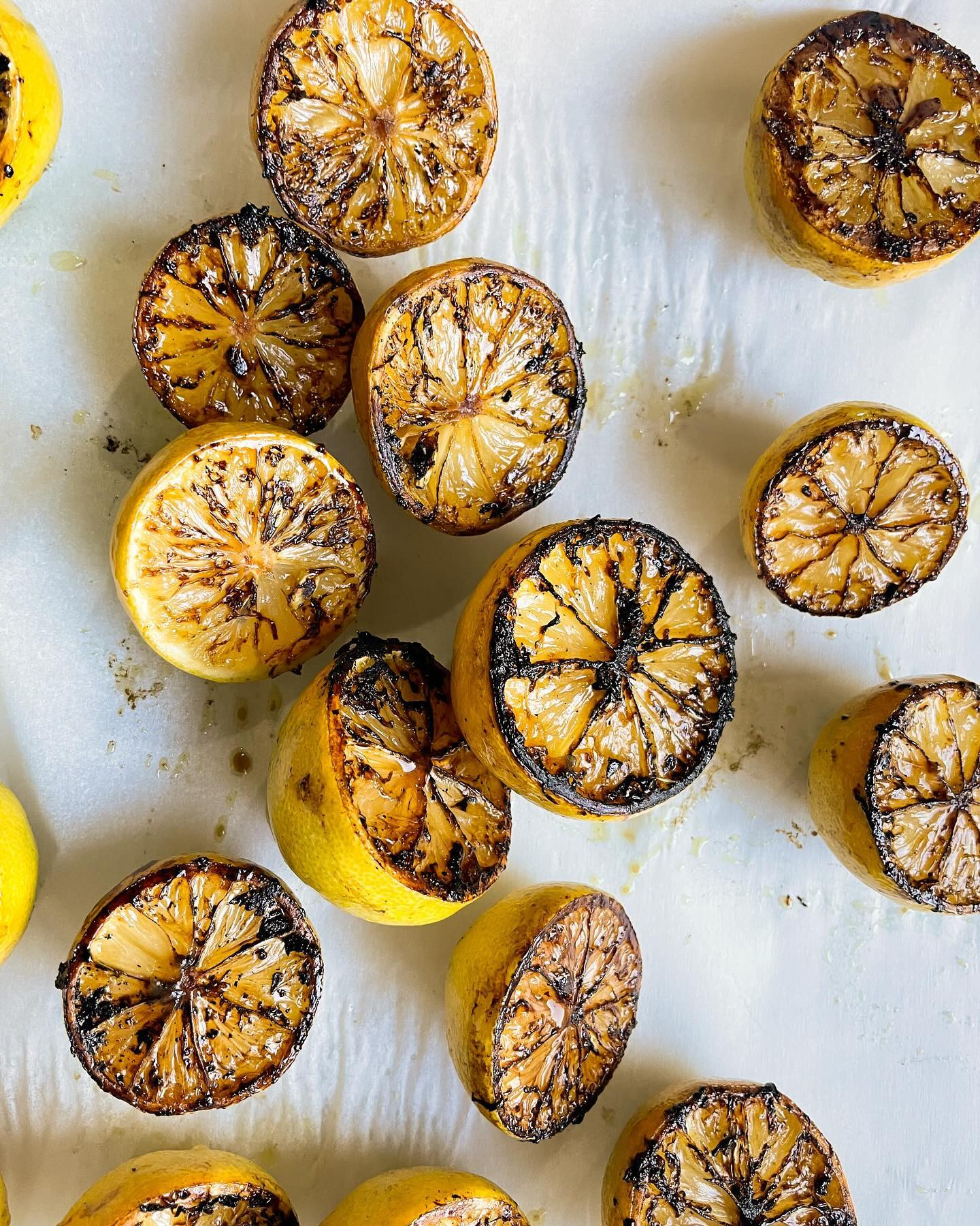 Bright yellow freshly charred lemons